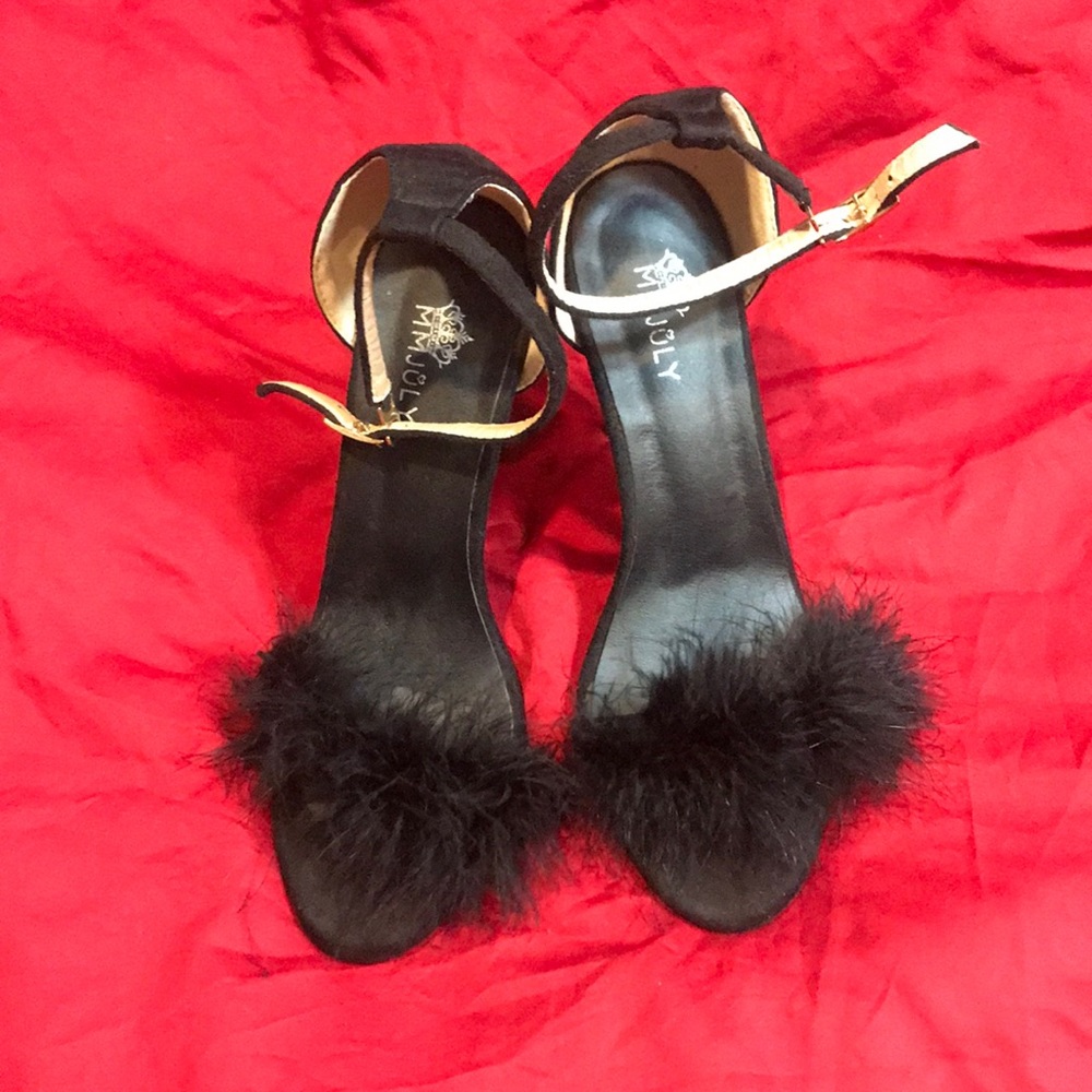 MM July. feathered all black. Size 42.